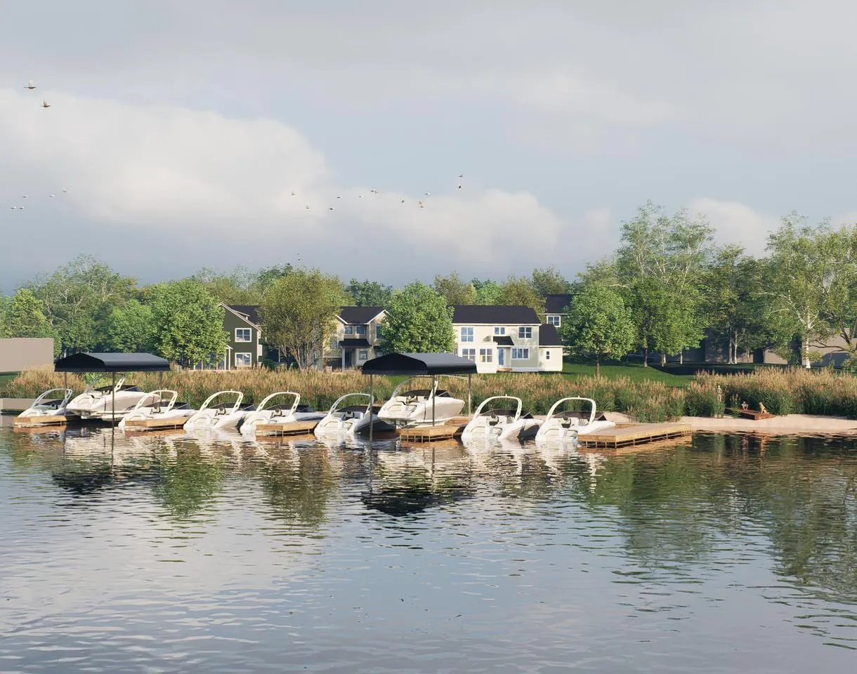 Private 40-foot boat slips lining Smith Bayou with cottage homes set behind the shoreline